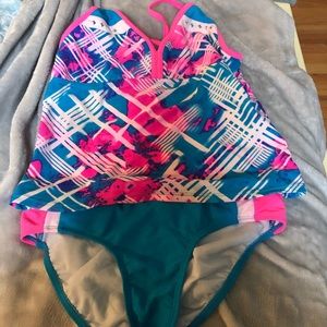 Cute bathing suit set (tankini and shorts).